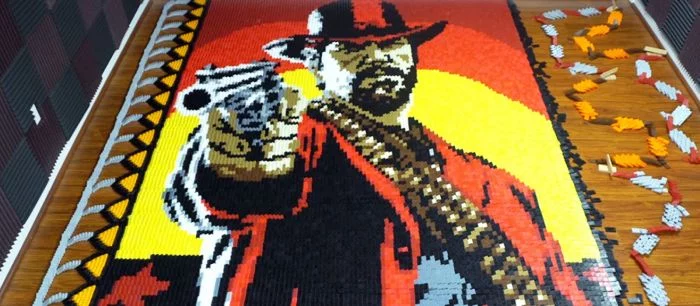 Фанат Red Dead Redemption 2 создал постер и логотип игры из 29 375 костей домино — видео