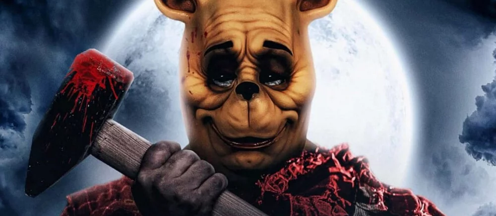 Появился постер хоррора, где Винни-Пух и Пятачок съели ослика Иа-Иа и стали жестокими убийцами