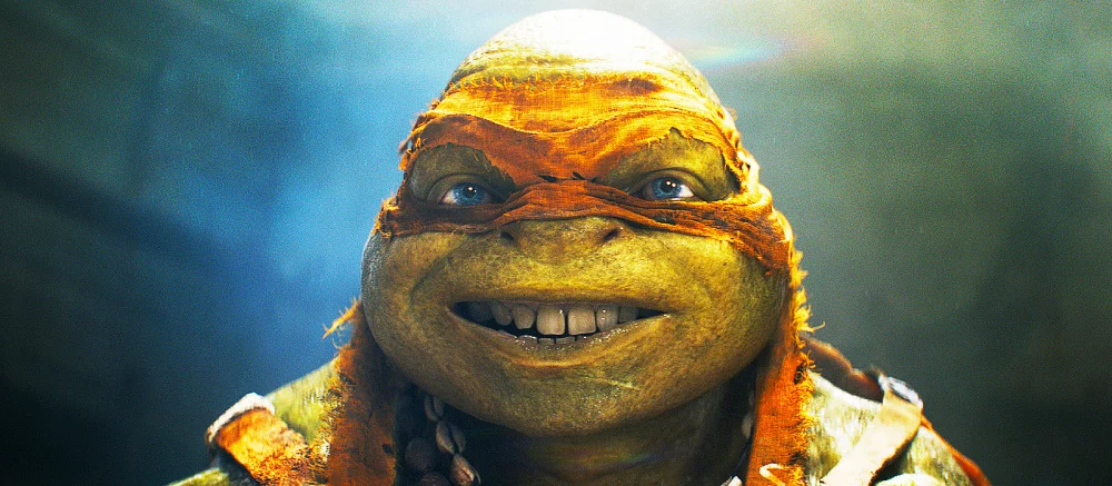 Показана очень криповая версия Микеланджело из «Черепашек-ниндзя». Бедолага объелся пиццы и выпучил глаза