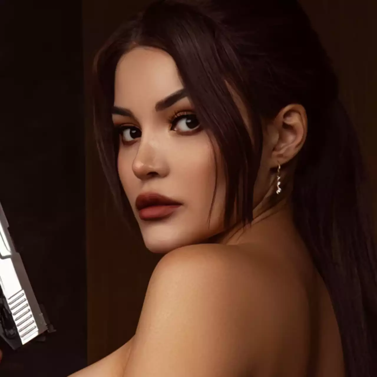 Косплеерша раздела Лару Крофт из Tomb Raider